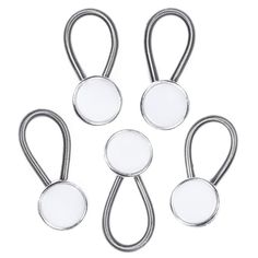 four silver metal hooks with white buttons on each end and one hook in the middle