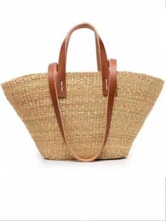 Casual style. Lightweight. Straw. Raffia natural fiber. Measurements are 40 cms. Length (15.74” inches) x 24cms height (9.4” inches). Color may be lighter or darker depending of the device it is displayed. Brown Rattan Shoulder Bag With Large Capacity, Brown Large Capacity Rattan Shoulder Bag, Large Capacity Brown Rattan Shoulder Bag, Elegant Natural Straw Tote Bag, Elegant Brown Straw Bag With Double Handle, Brown Rattan Tote Beach Bag, Casual Brown Straw Bag Of Palm Leaf, Casual Brown Palm Leaf Straw Bag, Brown Jute Top Handle Bucket Bag