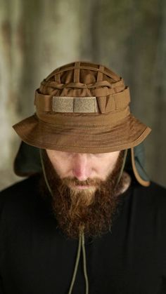 Chin strap bucket hat with neck cover, tactical  cooling boonie hat, fishing boonie hat for man This durable outdoor bucket hat is the perfect sun protection hat for men. The hat is perfectly suited for both urban environments and nature escapades. Ideally suited for military personnel and law enforcement, it's also the choice for adventure seekers including airsoft players, hikers, fishermen, and hunters. Features   * Neck Protection: Boonie hat features a snap buttons neck guard for enhanced s Bonnie Hat, Outdoor Hut, Adventure Hat, Boonie Hat, Art Items, Bucket Hat Design, Neck Cover, Sun Protection Hat, Hat For Man