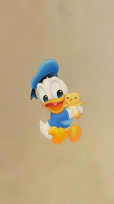 a cartoon duck holding a yellow teddy bear in its arms and wearing a blue hat