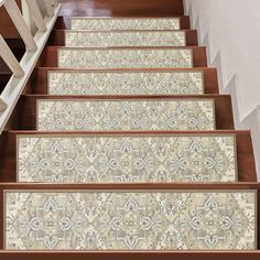 the stair treads are decorated with floral designs