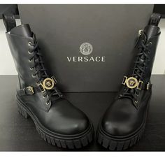 Brand New In Box Versace Womens Medusa Logo Black Ankle Combat Boots Us10 Eu40. Comes With Box & Dust Bag. Retail Price $1675. Luxury Women's Combat Boots With Front Lace-up, Versace Platform Boots, Luxury Gold Boots, Luxury Platform Ankle Combat Boots, Versace Shoes Women, Luxury Ankle-high Women's Combat Boots, Versace Womens, Versace Cross Boots, Leather Combat Boots Women