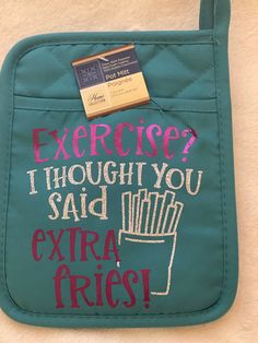 a green purse with writing on it that says exercise i thought you said extra fries