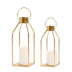 two gold metal lanterns with white candles in them on a white background, one is open and the other has a candle inside