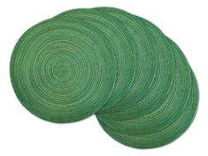 three green colored paper circles on a white background