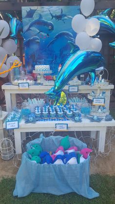 an ocean themed party with balloons and decorations