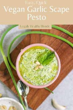 an overhead view of a bowl of vegan garlic scape pesto