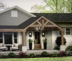 a house that has some chairs in front of it and plants on the outside porch