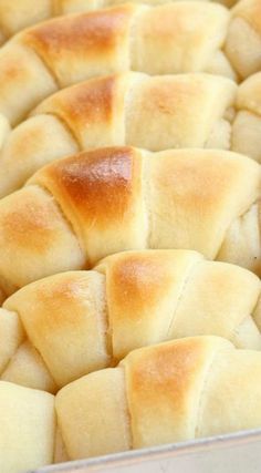 a baking dish filled with bread rolls