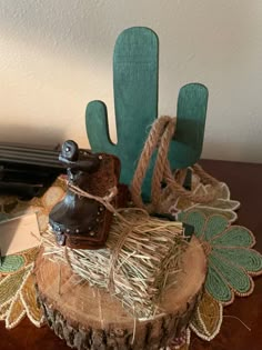 a piece of wood that has some kind of boot on top of it, sitting on a table