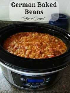 a crock pot filled with food sitting on top of a counter