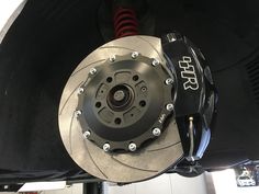 the front brake and disc of a car