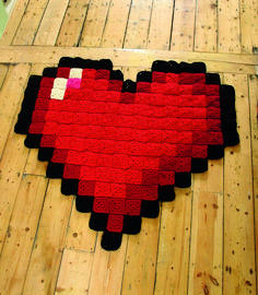 a heart shaped rug is on the floor