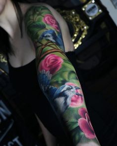 a woman with a tattoo on her arm