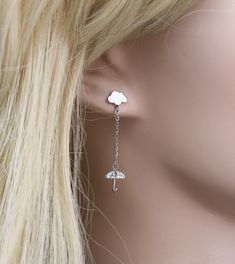 "☞ These earrings are a pair. ♥Cloud Earrings with raindrop umbrella♥ Cloud earrings with raindrops umbrella | Rain Cloud earrings | Raindrop earrings | earring/rain and cloud Simple daily earrings You good choice! ∙ ∙ ∙ ∙ ∙ ∙ ∙ ∙ ∙ D E T A I L S ∙ ∙ ∙ ∙ ∙ ∙ ∙ ∙ ∙ ∙ - MATERIAL: High-Quality Surgical steel. -Color : Silver, Clear -Dimension : Cloud - W:8mm X L:5mm, Rain : 24mm ,umbrella - W: 7 .5mm X L : 9mm - Bar thickness :1.2mm 16G ∙ ∙ ∙ ∙ ∙ ∙ ∙ ∙ ∙ ∙ P R E P A R A T I O N ∙ A N D ∙ P R O C E Raindrop Stud Earrings, Outer Conch, Umbrella Earrings, Raindrop Earrings, Daily Earrings, Rain Earrings, Back Piercings, Cloud Earrings, Cute Gifts For Her