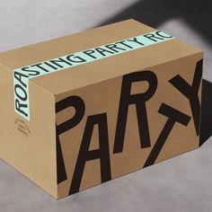 a cardboard box with the word party written on it