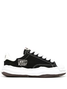 Black canvas Blakey low-top sneakers from MAISON MIHARA YASUHIRO featuring round toe, rubber toecap, logo patch at the tongue, front lace-up fastening, contrasting heel counter, branded insole and ridged rubber sole. | Maison Mihara Yasuhiro Blakey low-top sneakers Basket Sport, Food Babe, Dope Outfits For Guys, Shoe Inspo, Teenager Outfits