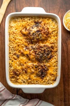 a casserole dish with cheese and meat in it