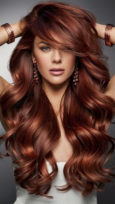 Deep Auburn Copper is a rich and intense shade that combines the depth of auburn with the warmth of copper. This color is ideal for those with medium to dark skin tones and looks especially striking on long, voluminous hair. The deep reddish hues bring out the richness of the copper, making it a perfect choice for those who want a dramatic and elegant look. Fall Hair Color For Brunettes Red Copper, Maroon And Copper Hair, Pretty Red Hair Color Ideas, Aurburn Hair Color, Dark Red And Copper Hair, Red Hair Haircuts Medium, Auburn Hair For Cool Skin Tones, Deep Brown Copper Hair, Cowgirl Copper Highlights