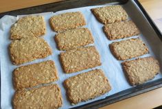 some cookies are sitting on a baking sheet and ready to be baked in the oven