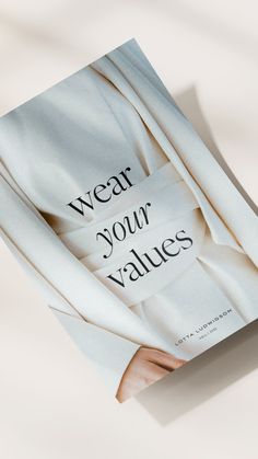 the book wear your value is sitting on a table