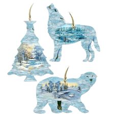 three polar bear ornaments with trees and snow in the foreground, one is holding an ornament