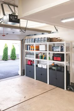 the garage is clean and ready to be used as a storage area for various items