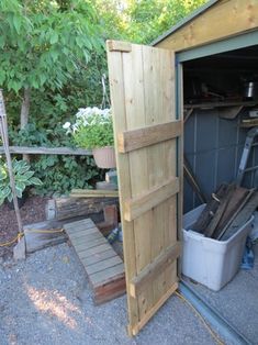 an outdoor storage shed with tools in it