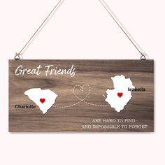 a wooden sign that says great friends are hard to find and impossible to forget