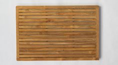 a wooden slatted surface mounted on a wall