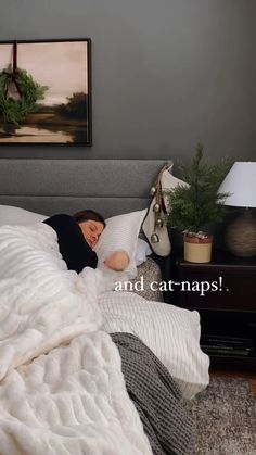 a woman is sleeping in her bed with the caption, and cat naps