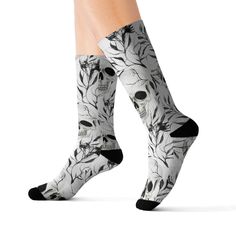 These high-quality socks with sublimated print provide optimum comfort with style wherever one might go - a subtle accent to complement an office look or an eye-catching statement for an extravagant outfit.\n\nPlease note: Dark color prints tend to make the side-seams more noticeable.\n.: Material: 95% polyester, 5% spandex\n.: 3 different sizes\n.: Unisex regular fit\n.: Ribbed tube\n.: Cushioned bottoms\n.: Please note: Printed with flat sublimation method. Color discrepancy can be seen on side seams Sublimation Socks, Halloween Sublimation, Skull Halloween, Dark Color, Halloween Skull, Socks And Hosiery, Hosiery, Colorful Prints, Favorite Outfit