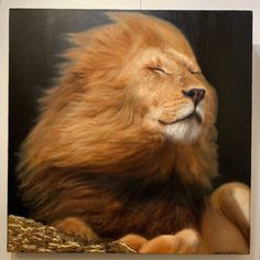 a painting of a lion laying down with its eyes closed