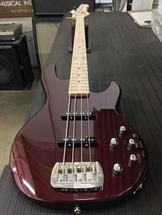 an electric guitar sitting on top of a table