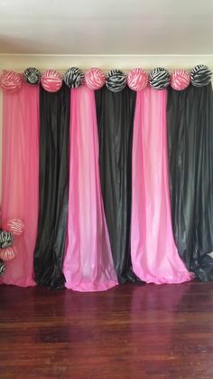 pink and black curtains with zebra print on them