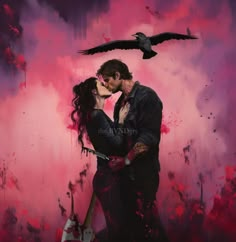 a man and woman kissing in front of a painting with birds flying over the background