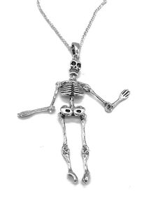 Brand new, 925 sterling silver moving body parts Gothic skeleton pendant.The size of pendant is 50 mm by 11 mm.It comes without chain or with 16", 18" or 20" 925 sterling silver curb chain.They are made of 925 Sterling Silver and stamped 925 silver mark. Do not be fooled by cheap silver plated jewellery.It comes in a pretty gift bag. Royal Mail Stamps, Gothic Skeleton, Human Skeleton, Skull Pendant, Silver Plated Jewelry, Pretty Gift, Curb Chain, Charm Pendant, Gift Bag