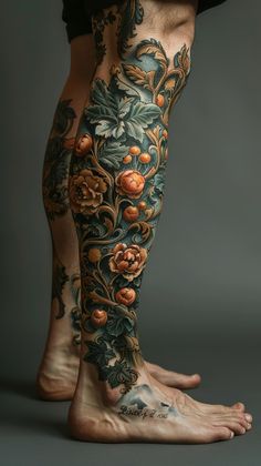 a man with tattoos on his legs and leg is shown in full blooming flowers