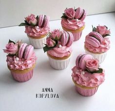 cupcakes decorated with pink frosting and flowers