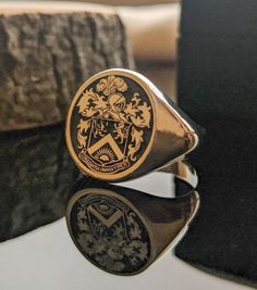 "Silver Coat of Arms Signet Ring , Crest Ring, Family Crest Rings , Custom Signet Ring, Family Crest Signet Ring, Personalized Signet Ring ❥You can send us your family logo or symbol and order your product. When we receive your order, we will send you a sketch of your logo and ask for your confirmation. After you confirm your logo, we will immediately start manufacturing your product. ☞ ☞ ☞ ITEM DESCRIPTION ☜ ☜ ☜ * Material : 925K Sterling Silver * Ring Face Size Options ; - Small Face Size : 14 Class Rings College, Family Crest Rings, School Rings, College Rings, Custom Signet Ring, Family Ring, Graduation Rings, Signet Rings Women, Family Logo