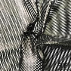 Black Laminated Fishnet Mesh One-way stretch Reflective surface Content - Vinyl/Nylon Color - Black Width - 62" Fabric Care - Dry Clean Only Black Netting Fabric, Cotton Netting Fabric, Net Material Fabrics, Upholstery Fabric Net, Embroidered Leaves, Fashion District, Reflective Surfaces, Nyc Fashion, Silk Organza