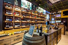 the inside of a liquor store with lots of bottles