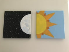 two canvases with sun and moon painted on them