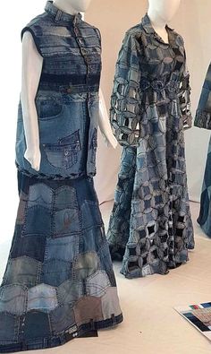 three mannequins are dressed in denim dresses