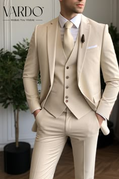 Suits for men, Beige men's Suit, 3 Piece suit, party wear suit, Fashionable suit for men, Prom suit , men elegant suit Elevate your wardrobe with our timeless and sophisticated Classic Beige Three-Piece Suit for men. This meticulously tailored ensemble is designed to bring out your best in every formal or semi-formal occasion. Crafted from high-quality materials, this beige three-piece suit exudes both comfort and confidence. The versatile color allows for effortless pairing with a range of shirts and accessories, making it an essential addition to your collection. The jacket features a notch lapel, adding a touch of classic elegance. The tailored trousers and waistcoat complete the ensemble, offering a polished look that stands the test of time. Whether you're attending a business meeting Prom Suit Men, Stylish Mens Suits, Beige Suits, Mens Fashion Blazer, Suit For Men, Dress Suits For Men, Designer Suits For Men, The Rising Sun