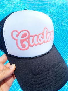 Super fun trucker hats that can be customized with your team name, mascot, phrase and more!   They are created with puff embossed print and look fantastic in our huge assortment of puff colors. Hat Colors:  All Black, All White, Black Back with White Front, Khaki Closure: The back is an adjustable snap back Please List: 1. Text Style ( Script or Athletic Font Shown) ** please reach out first if you have a custom text or logo. 2. Text on Hat (8-10 characters) ** the more characters there are the Customizable Custom Baseball Cap With Curved Bill, Customizable Pink Snapback Hat With Curved Brim, Customizable Novelty Trucker Hat, Customizable Novelty Trucker Hat For Gift, Customizable Novelty Trucker Hat As Gift, Novelty Customizable Trucker Hat, Customizable Fun Style Trucker Hat Snapback, Personalized Pink Snapback Trucker Hat, Customizable Fun Style Snapback Trucker Hat