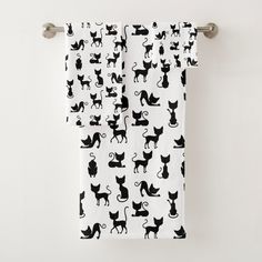 a black and white curtain with cats on it