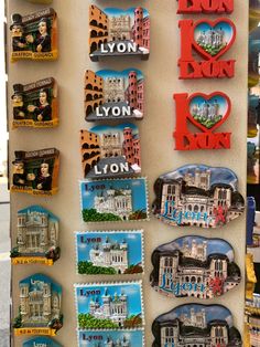 a refrigerator with magnets on the front and back of it that say i love london