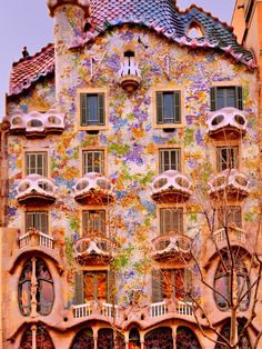 an ornate building with many windows and balconies