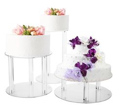 three tiered cake stands with flowers on them